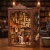 Miniaturowy domek Book Nook - Książka przy kominku