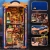 Miniaturowy domek Book Nook - Fiesta po lampionami