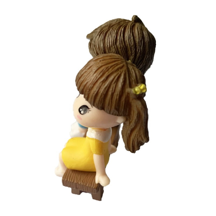 Dziewczynka i chłopiec na ławce z książką 2.jpg