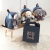 Jeans'owy plecaczek z odpinanym szarym słonikiem „Elephant puppy”